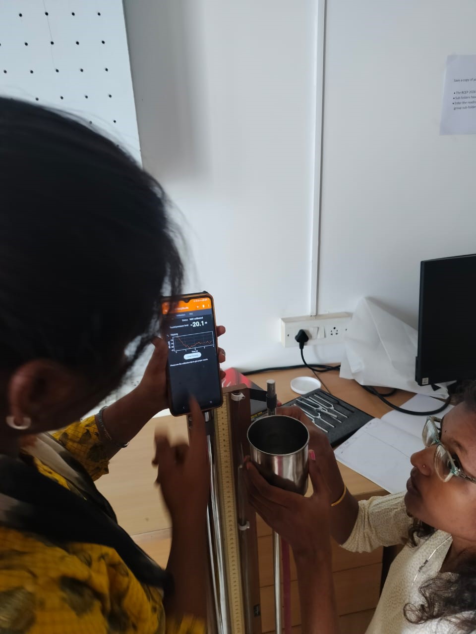 Shalini using app to see sound